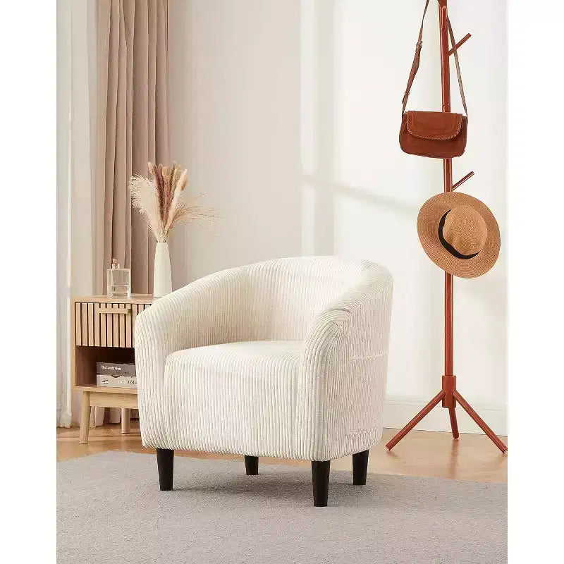 Fauteuil club 28 en velours avec dossier en U, accoudoirs incurvés et assise rembourrée douce pour salon et chambre