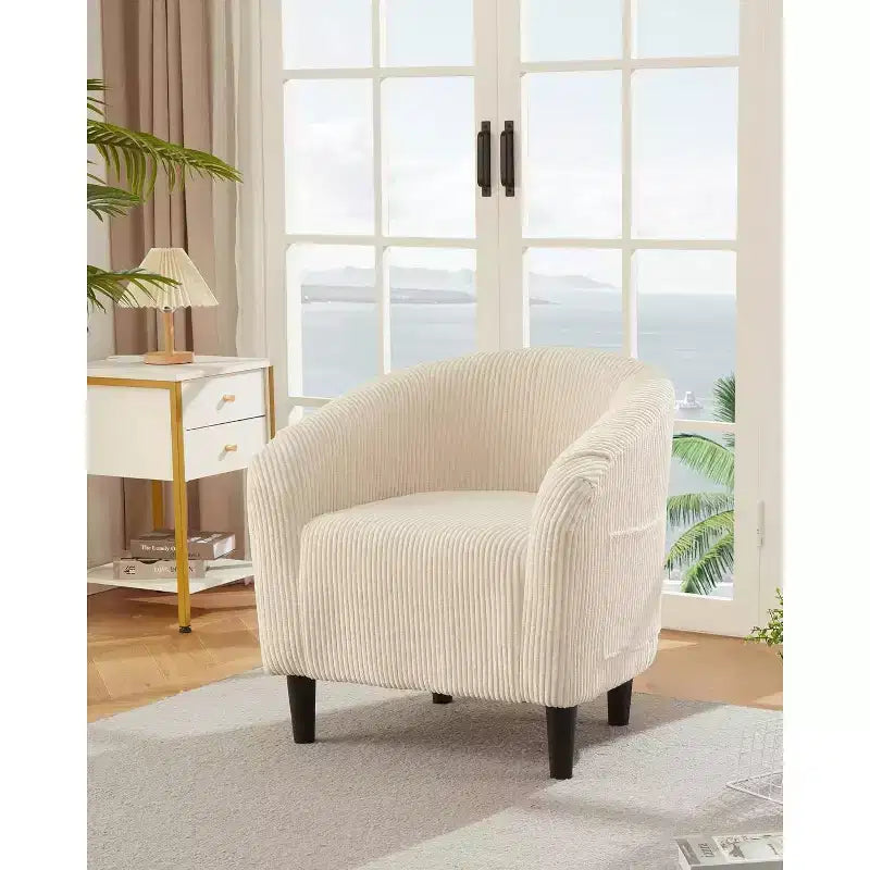 Fauteuil club 28 en velours avec dossier en U, accoudoirs incurvés et assise rembourrée douce pour salon et chambre