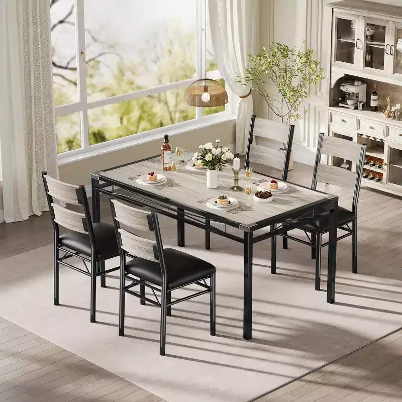 Ensemble de table à manger peu encombrant en MDF avec base en fer et chaises gigognes pour petite cuisine, appartement ou coin petit-déjeuner