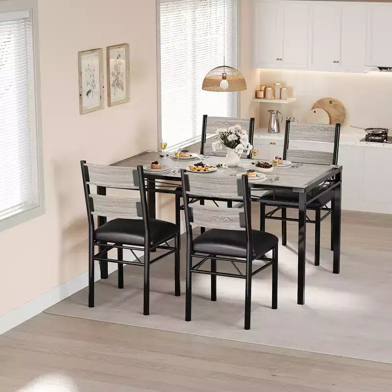 Ensemble de table à manger peu encombrant en MDF avec base en fer et chaises gigognes pour petite cuisine, appartement ou coin petit-déjeuner
