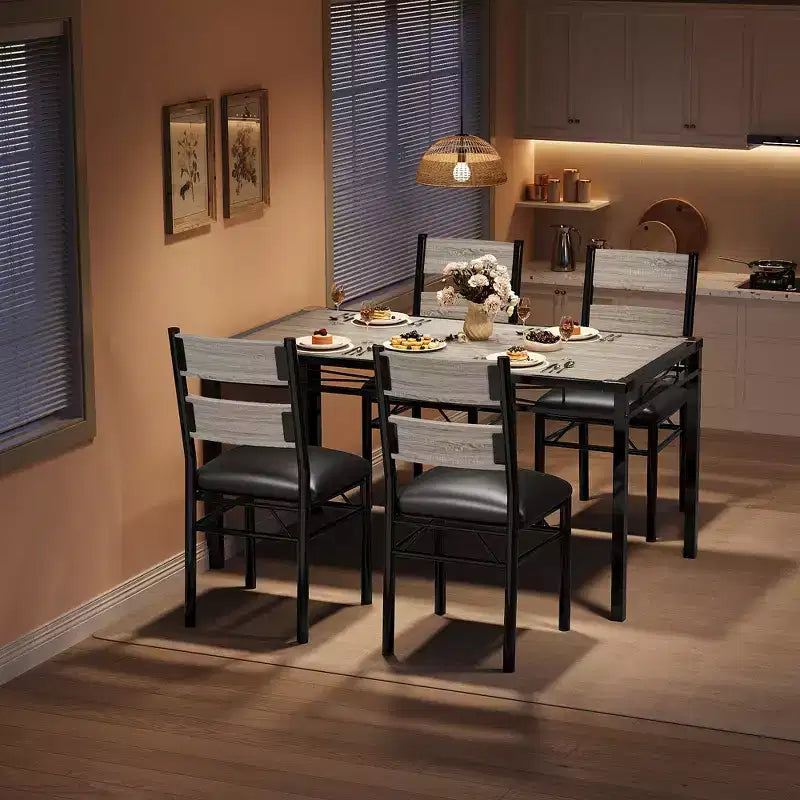 Ensemble de table à manger peu encombrant en MDF avec base en fer et chaises gigognes pour petite cuisine, appartement ou coin petit-déjeuner