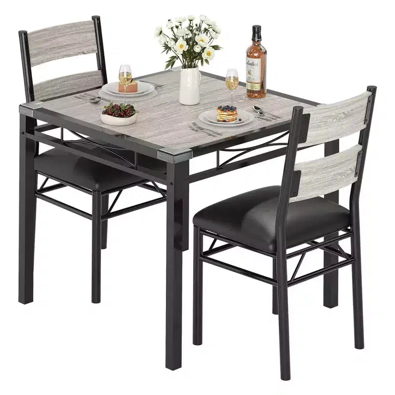 Ensemble de table à manger peu encombrant en MDF avec base en fer et chaises gigognes pour petite cuisine, appartement ou coin petit-déjeuner
