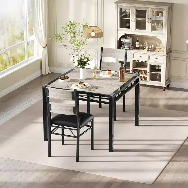 Ensemble de table à manger peu encombrant en MDF avec base en fer et chaises gigognes pour petite cuisine, appartement ou coin petit-déjeuner