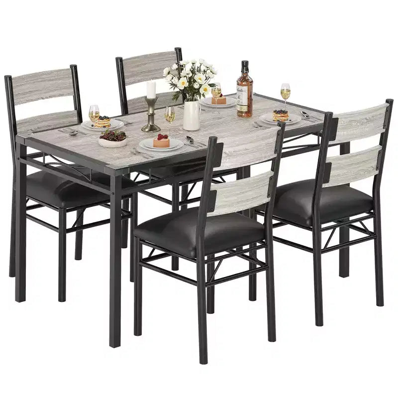 Ensemble de table à manger peu encombrant en MDF avec base en fer et chaises gigognes pour petite cuisine, appartement ou coin petit-déjeuner